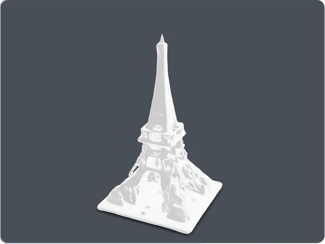 A 3D render shows a detailed Eiffel Tower model standing upright.